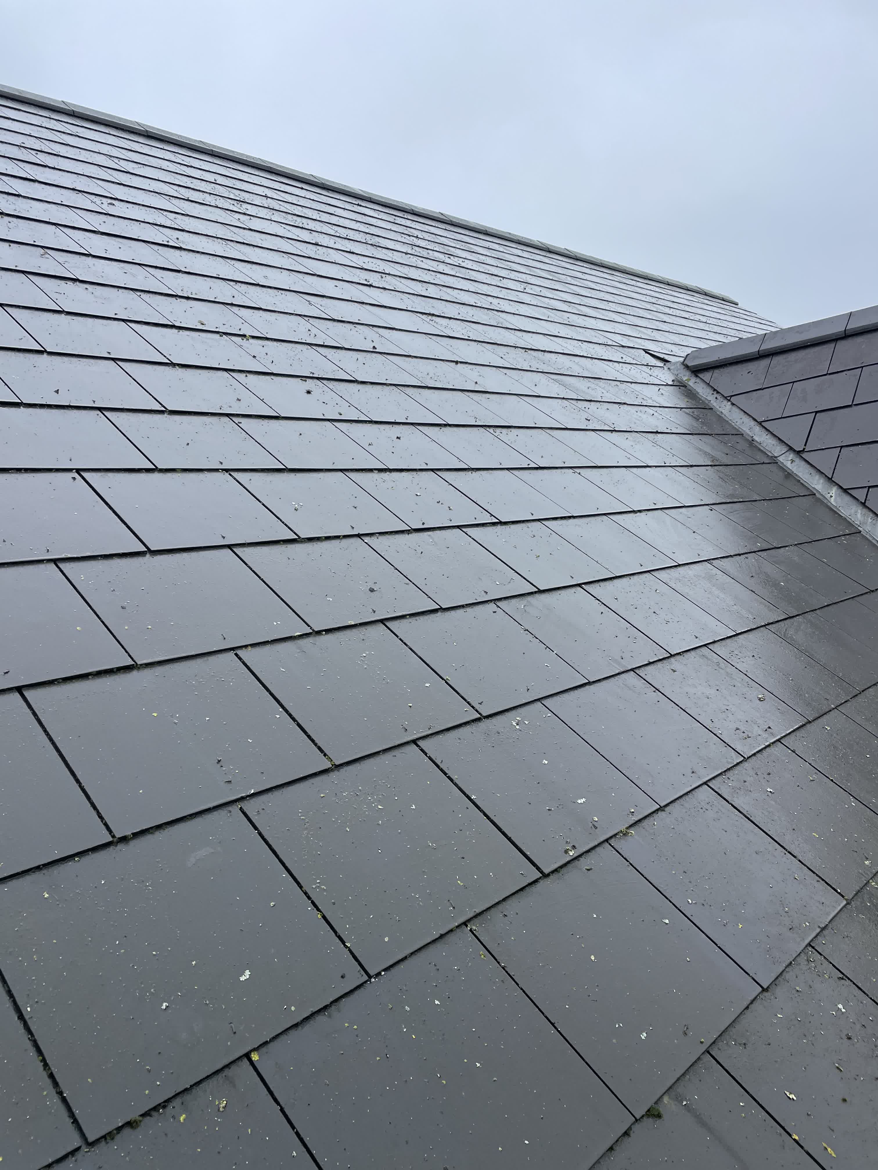 Slate roof after roof maintenance and cleaning by Perfect Roofing