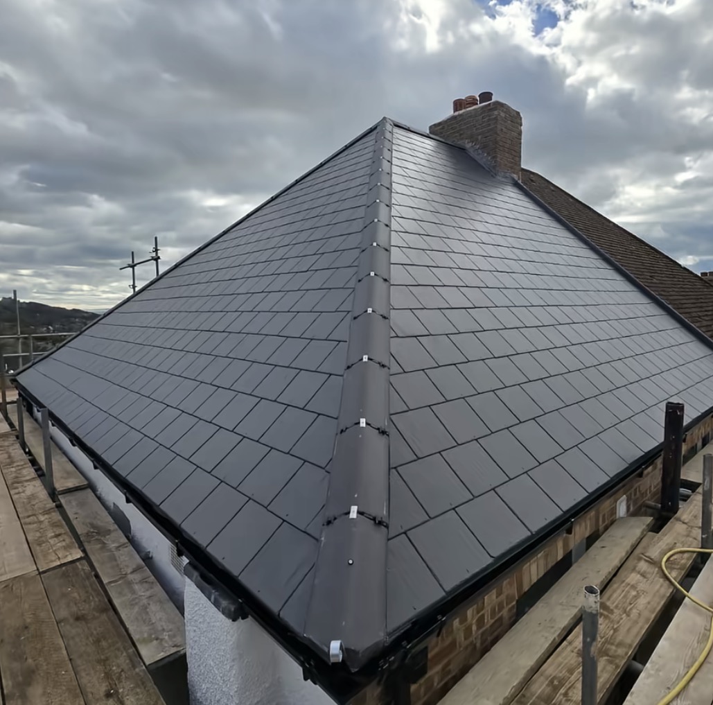 Finished slate roof with ridge and verge details by Perfect Roofing